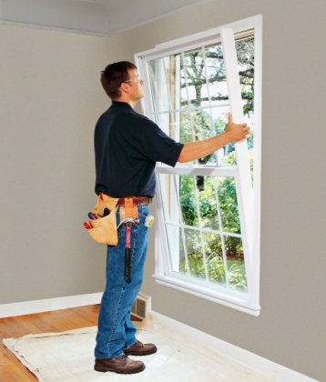 Man Installing Window Bought Online